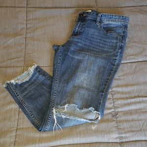 Free People size 30 distressed step hem ankle jean